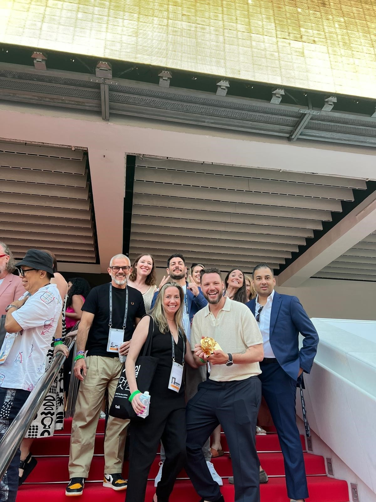Cannes 2025 Team Photo with Award